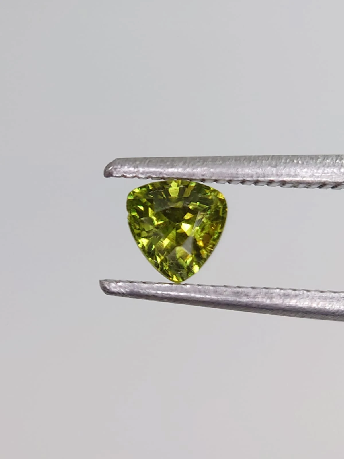 0.46ct Triangular shape Demantoid Garnet From Pakistan — view 3